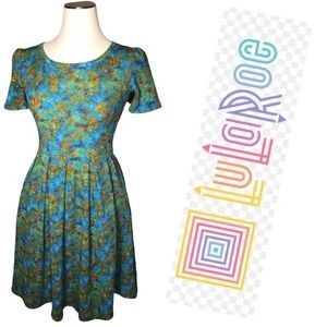 LuLaRoe gorgeous tropical colored dress XXS perfect for summer! Has POCKETS!👗🌴